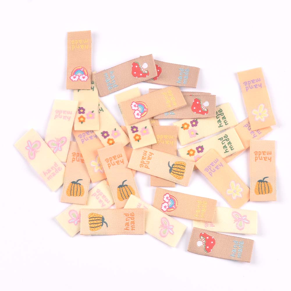 Baby Clothing Labels - 50 قطعة من الملصقات القماشية المطرزة